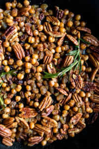 crispy harissa chickpeas and pecans in the pan