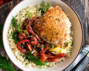 Crispy Chicken Thighs with Herb Orzo & Stewed Peppers