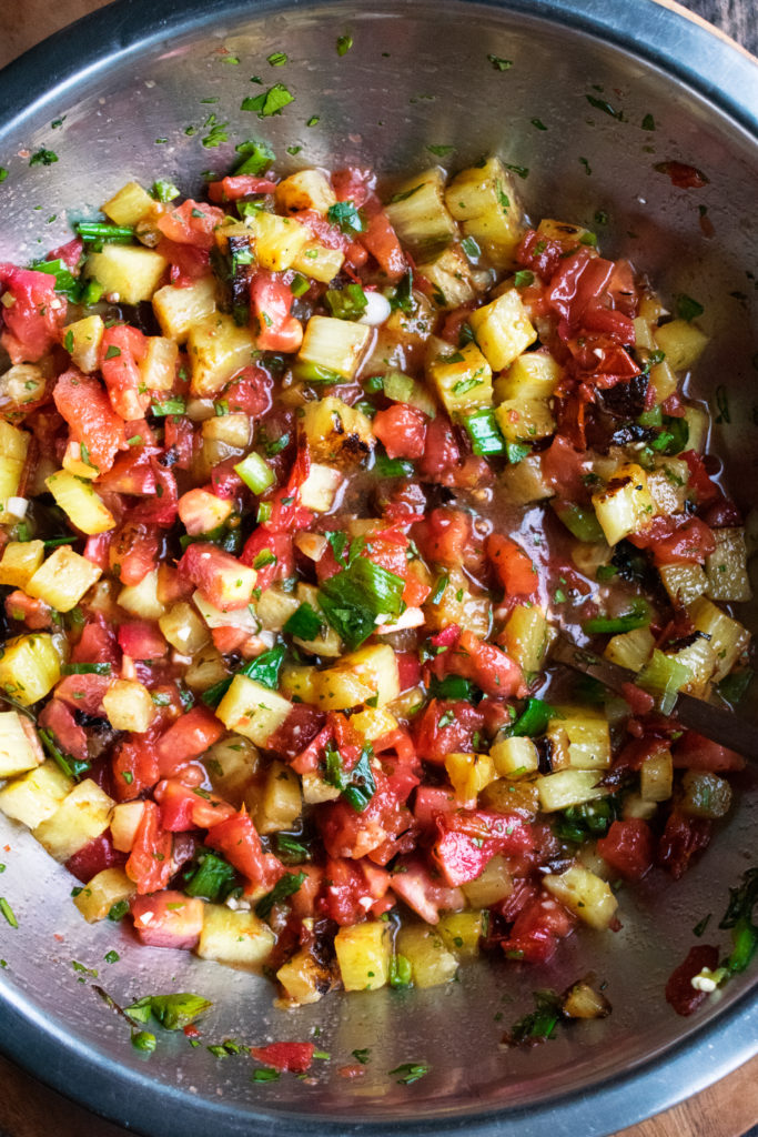 charred pineapple salsa in mixing bowl