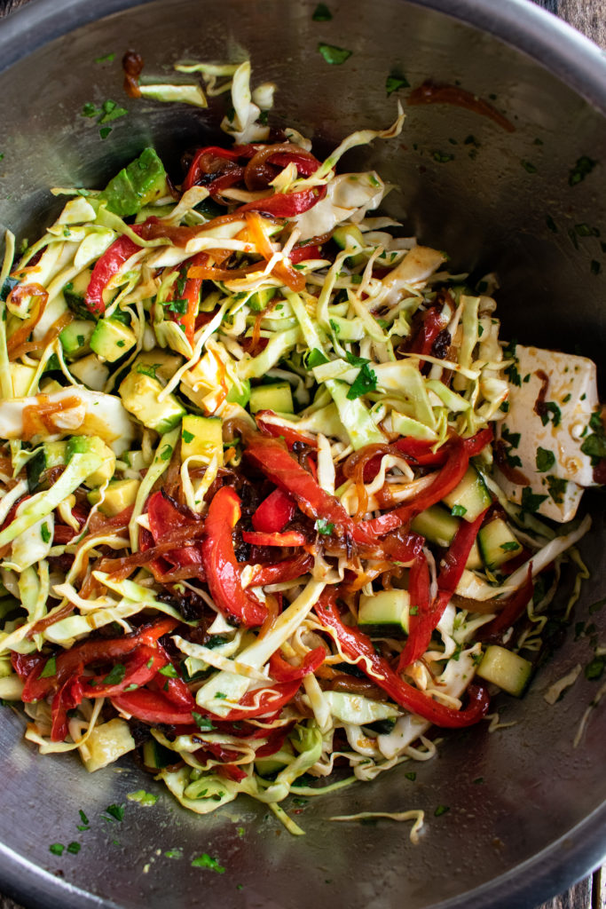 red pepper slaw ingredients mixed in a bowl