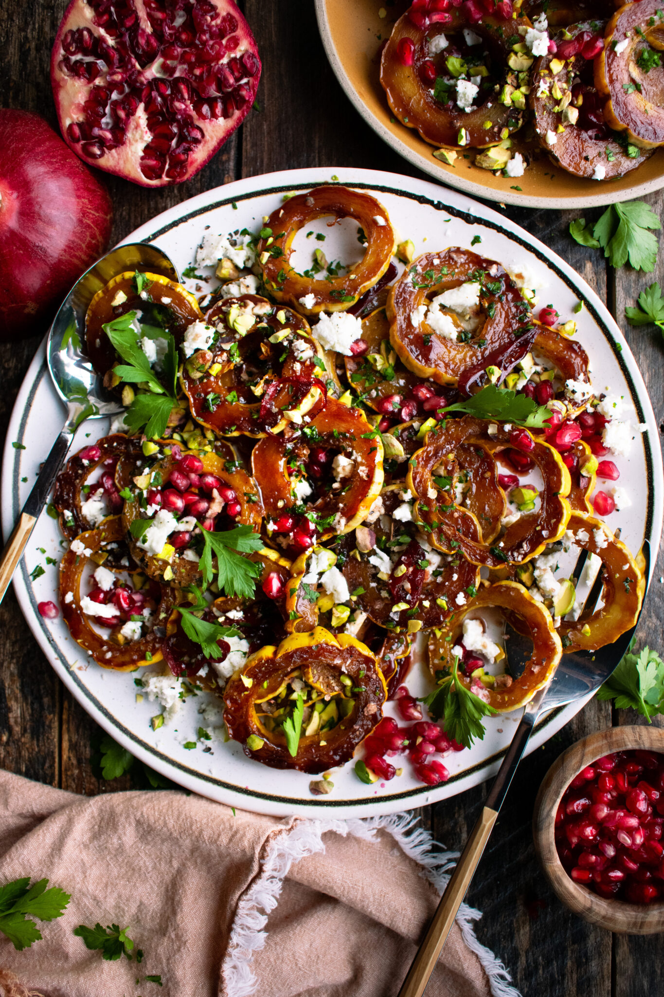 Pomegranate Glazed Delicata Squash with Feta & Pistachios The