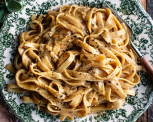 finished plate of roasted onion butter fettuccine