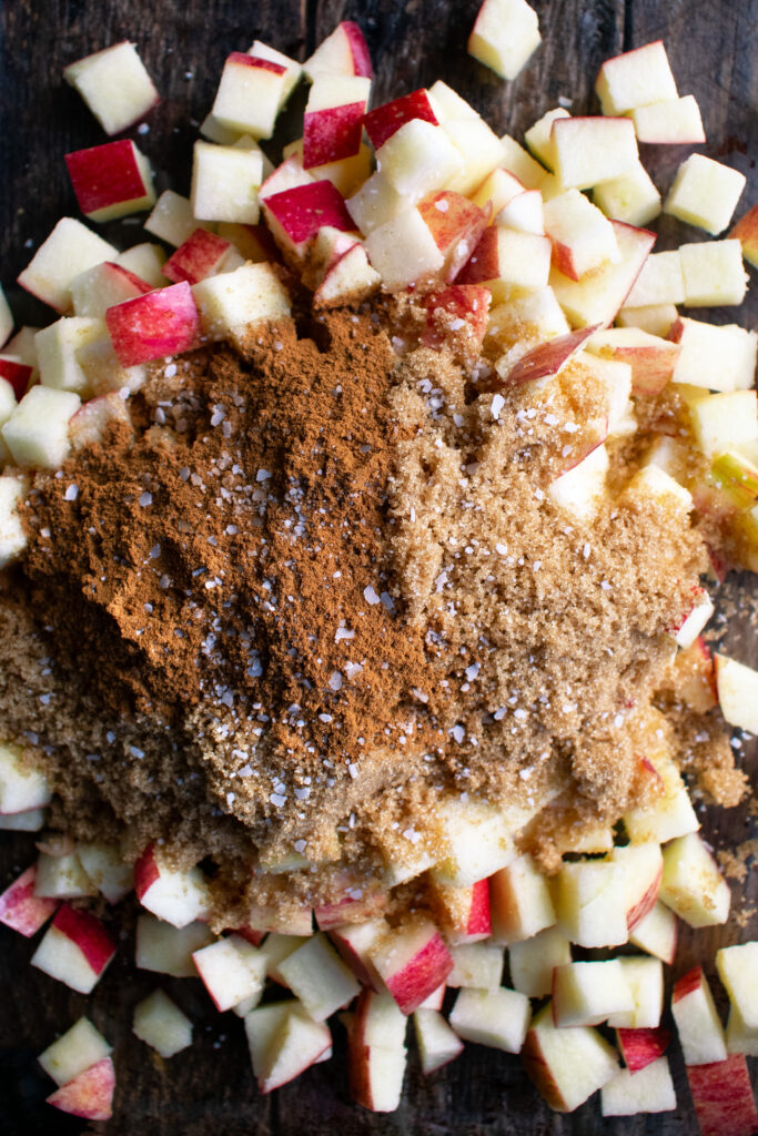 apples with brown sugar and spices before baking