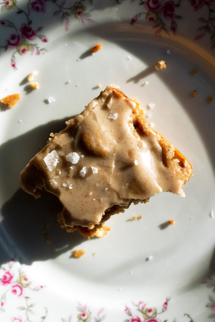 a Spiced Apple Pecan Blondie with a bite taken out of it