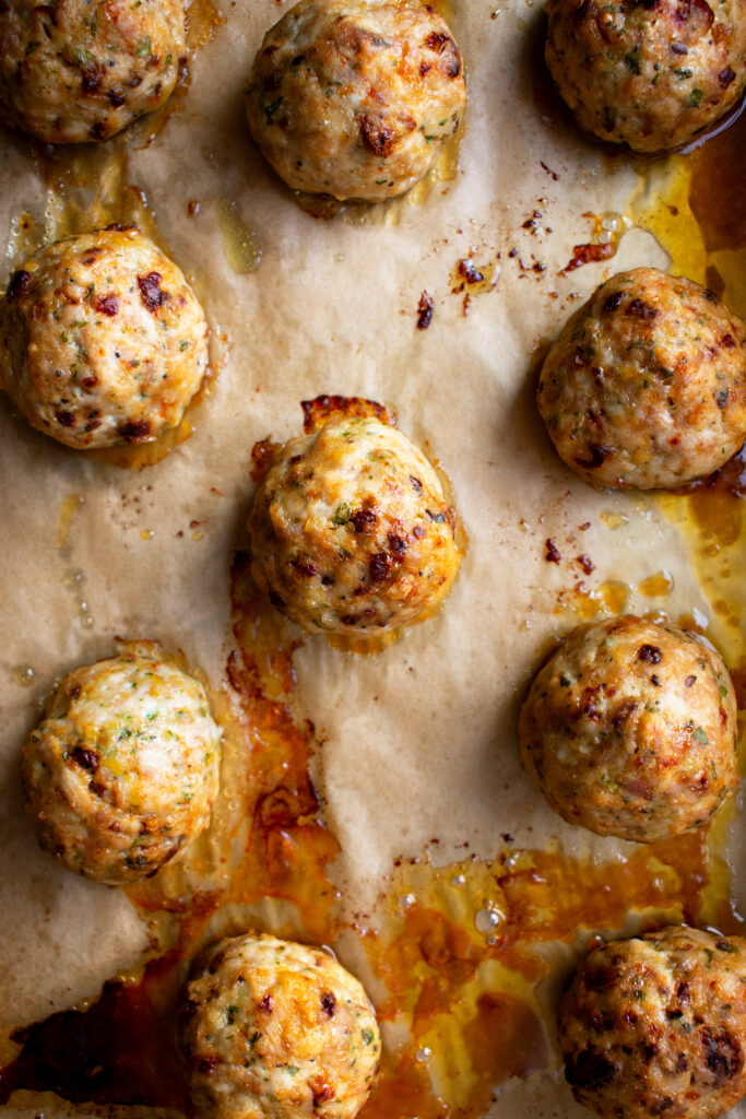 meatballs on a sheet pan after baking