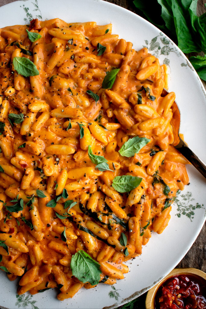 Creamy Basil & Calabrian Chile Cavatelli on a serving platter