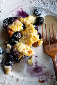 one bite left of Baked Blueberry French Toast on a plate
