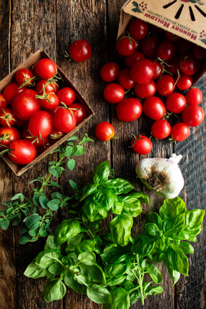 fresh cherry tomatoes, garlic, and herbs