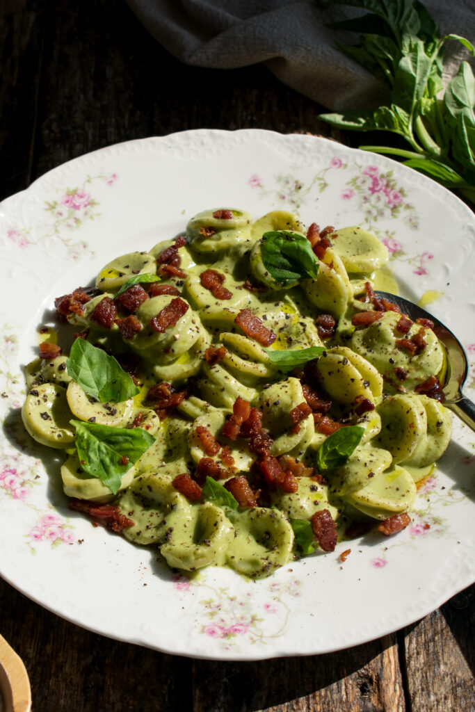 finished plate of Creamy Basil Orecchiette with Peas & Pancetta