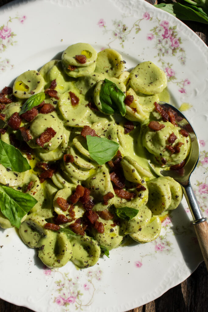 finished plate of Creamy Basil Orecchiette with Peas & Pancetta