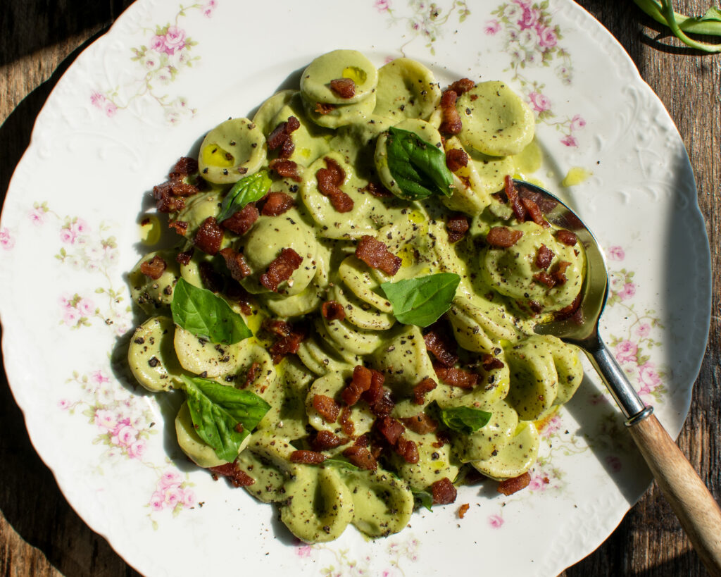 finished plate of Creamy Basil Orecchiette with Peas & Pancetta