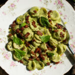 finished plate of Creamy Basil Orecchiette with Peas & Pancetta