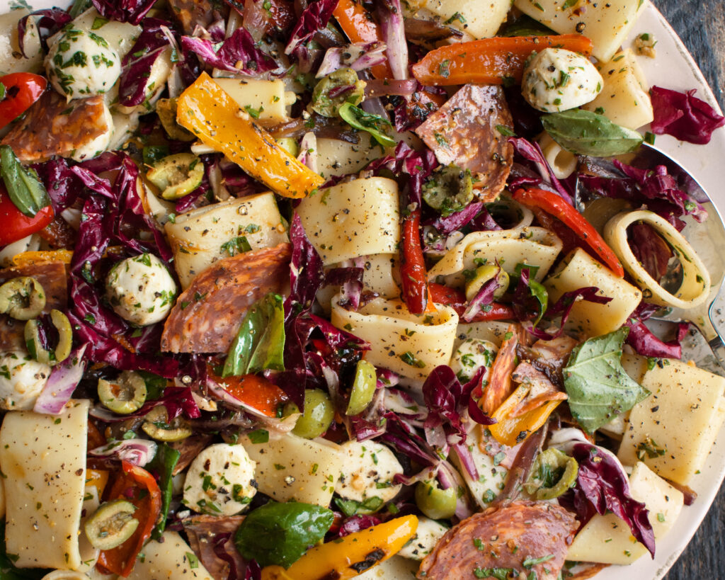 a large platter of Italian Pasta Salad