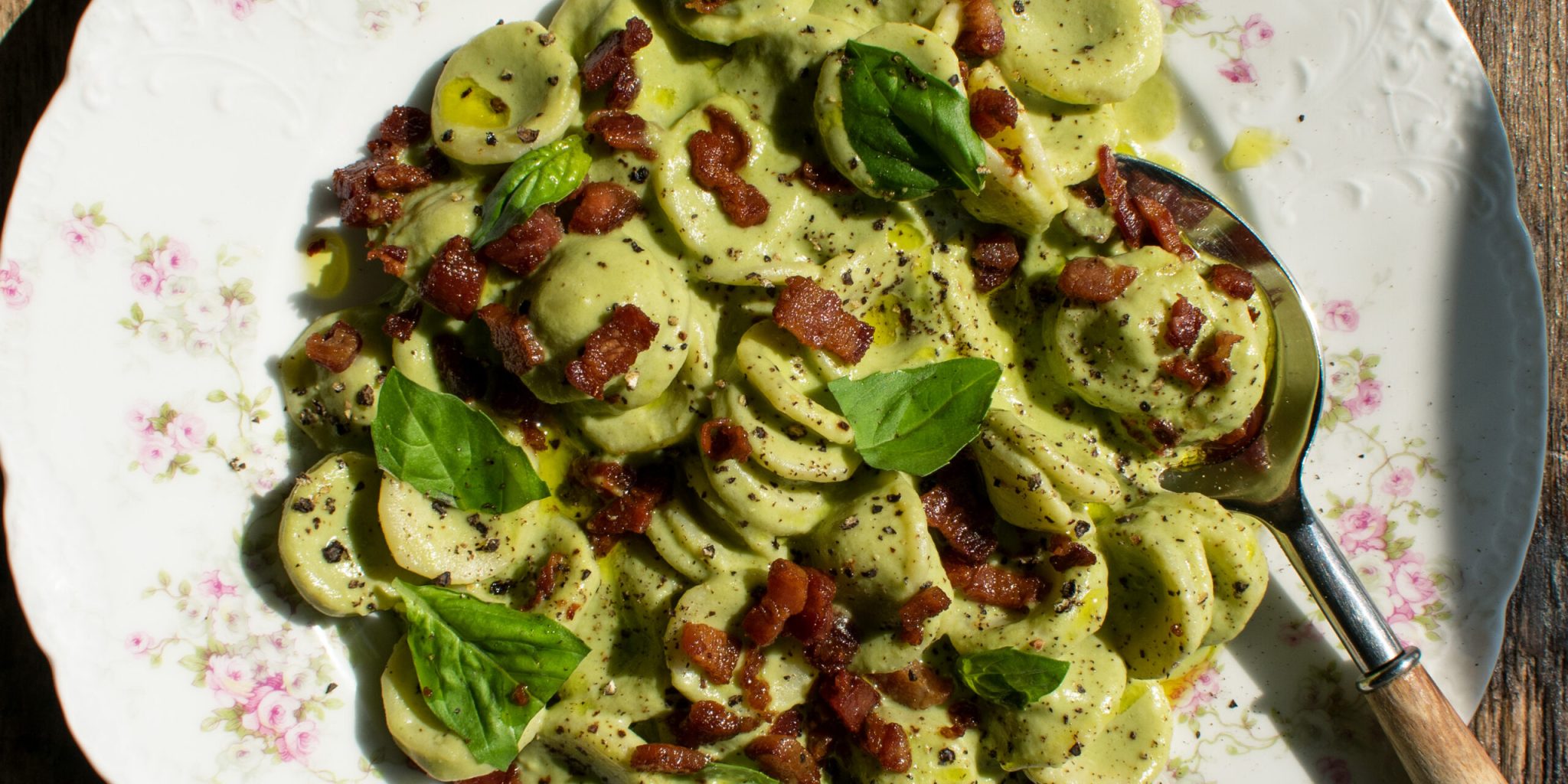 finished plate of Creamy Basil Orecchiette with Peas & Pancetta